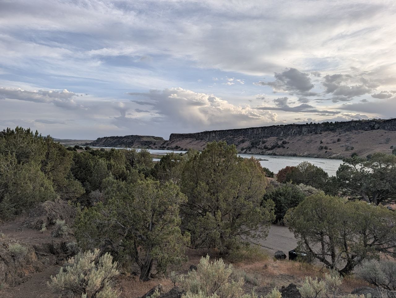 Snake River canyon landscape near Massacre Rocks State Park under wide clouds